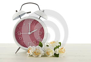 Daylight Saving Time concept with spring theme photo
