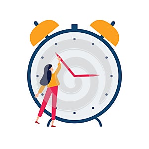 Daylight saving time concept. Young woman turn the hand of the clock. Turning to winter or summer time, alarm clock