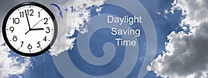 Daylight Saving Time DST. Blue sky with white clouds and clock. Turn time forward +1h