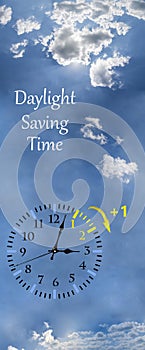 Daylight Saving Time DST. Blue sky with white clouds and clock. Turn time forward +1h photo