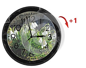 Daylight Saving Time DST. Wall Clock going to summer time +1. Turn time forward photo