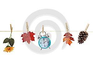 Daylight Savings Time with Clock Hanging from Clothes Line
