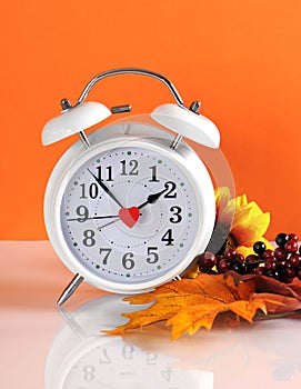 Daylight savings time ends in autumn fall with clock