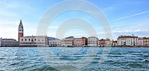 Daylight view from boat to Riva degli Schiavoni waterfront and c