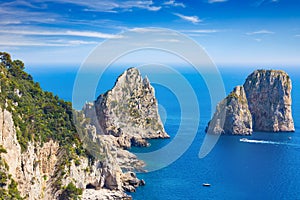 Daylight view of famous Faraglioni Rocks, Capri Island, Italy