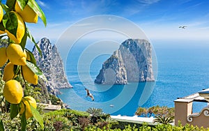 Daylight view of famous Faraglioni Rocks, Capri Island, Italy