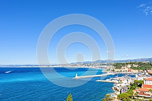 Daylight view to beachline and blue sea of Antibes, France