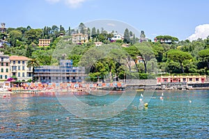 Daylight view to Rapallo city, beachline, mountains and sky