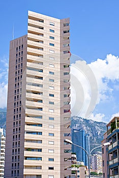 Daylight view to tall hotel building from bottom