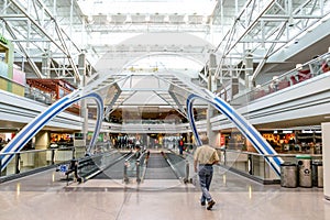 Daylighting roof structure with people walking and people movers