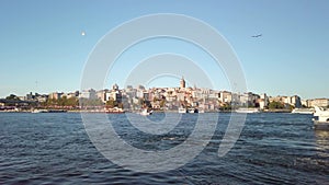 Daytime view: Istanbul's cityscape from Eminonu Pier.