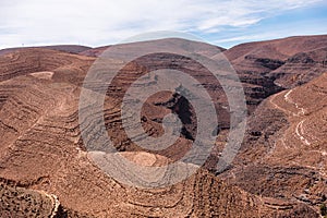 Daytime wide angle shoot of strata rock formations in the Lower Atlas Mountains, Morocco. Geology concept