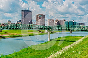 Bridge goes over the water in Dayton, Ohio and the Great Miami River photo