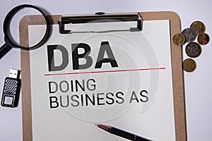 DBA Registration doing business as form on a table.