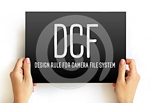 DCF - Design rule for Camera File system acronym text on card, abbreviation concept background