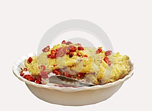 ddelicious quick meal local thai style deep fried omelette with load of red chilli on rice isolated die cut white background