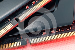 DDR4 DRAM memory chipset close-up in red light