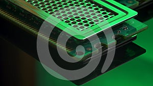 DDR RAM sticks on green light mirror background