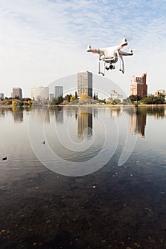 A dDrone Quadcopter Hoovers over Lake Merritt Oakland California