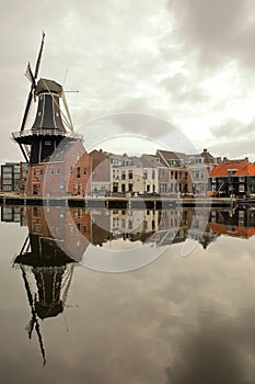 De Adriaan windmill reflecting on Spaarne river in Haarlem