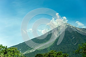 De Fuegp volcano above and SW of La Antigua, Guatemala photo