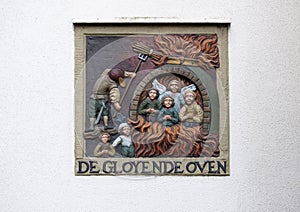 De Gloyende Oven, on a white blank wall on the Begijnhof, Amsterdam