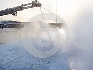 De-icing of aircraft wing in airport
