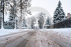 De-icing chemicals and sand on the winter road