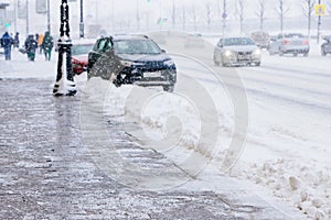 De-icing chemicals on winter road, Reagent - technical salt will make the road safe