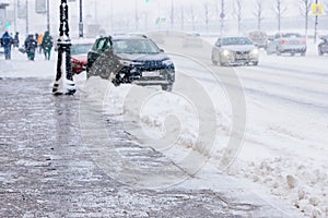 De-icing chemicals on winter road, Reagent - technical salt will make the road safe photo