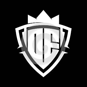 DE Letter monogram with triangle curve shield shape with crown white and black background color design photo