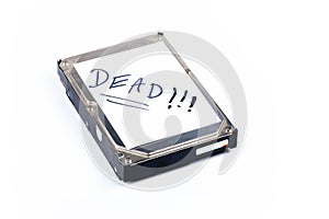 Dead defective silver metal 3.5 inch thick hard drive storage with a white text label isolated on white, object
