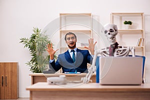 Dead employee working in the office