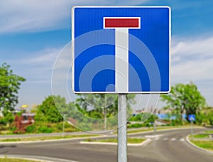 Dead end street traffic sign on road background