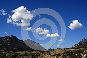 Dead Indian Pass - Clouds floating by - between Cody and Yellowstone National Park in Wyoming photo