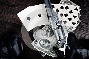 Dead man\'s hand. Two-pair poker hand consisting of the black aces and black eights and player hand with revolver