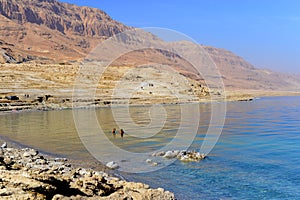 Dead Sea beach blue water sea shore landscape mounts and desert