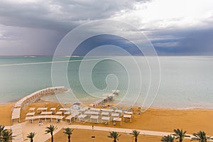 Dead sea beach shore tourist hotels, Ein Bokek. photo