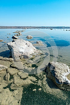 Dead Sea - Kuyalnik estuary, precipitation of self-precipitating salt on the rocks