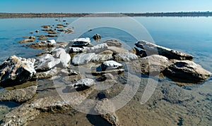 Dead Sea - Kuyalnik estuary, precipitation of self-precipitating salt on the rocks