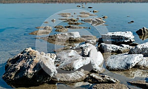 Dead Sea - Kuyalnik estuary, precipitation of self-precipitating salt on the rocks