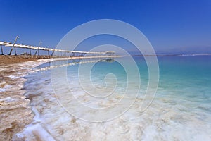 The dead sea resorts in Israel. View of the hotel and the beach