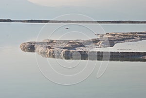 Dead Sea shore. Minerals and salt. Salt crystals at dawn.