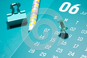 Deadline concept with push pin on calendar date