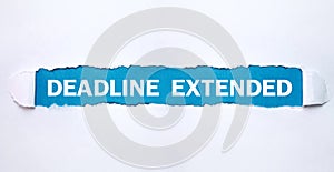 Deadline Extended text on torn paper photo