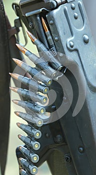 Deadly row machine gun bullets