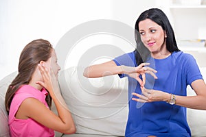 Deaf girl learning sign language