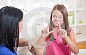 Deaf girl learning sign language