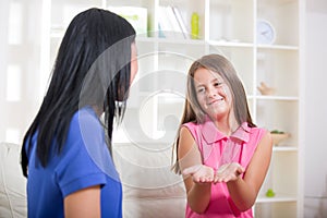 Deaf girl learning sign language