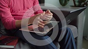 Deaf male hands with laptop online messaging